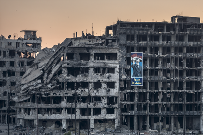 Sönderbombad fasad. Foto: Sergey Ponomarev