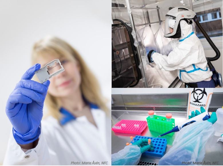 Forskare håller fram ett mätinstrument.