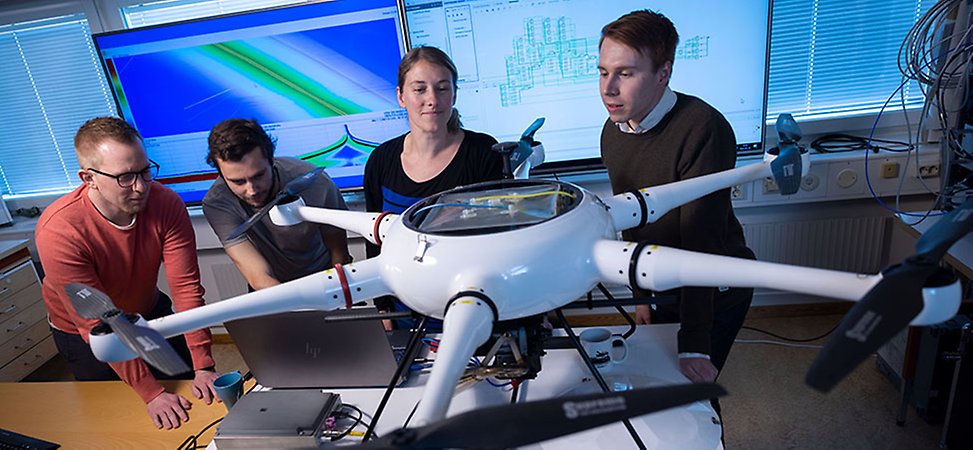 People workning with av large UAV 